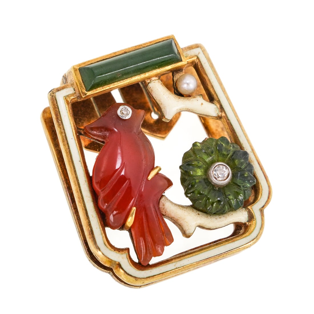 Cartier Dress Clip 14k, Diamond, Emerald, Carnelian Bird.: Rare signed Cartier dress clip. 14k yellow gold clip with white enamel accents carnelian carved bird with diamond eye, and emerald carved flower 8.5 mm diameter. 21 mm x 25 mm. 11.32 grams t.w.