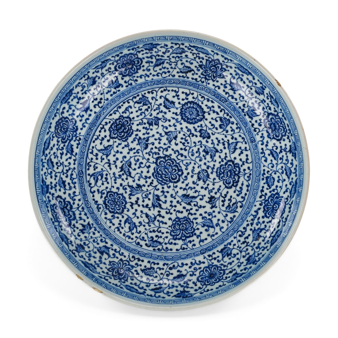 19th c Chinese Ming Style Blue & White Charger: 18th- 19th c Chinese Ming style blue & white porcelain charger, repeating flower and vine pattern, character mark artist signature on unglazed rim base, small imperfection on rim, diameter 16"