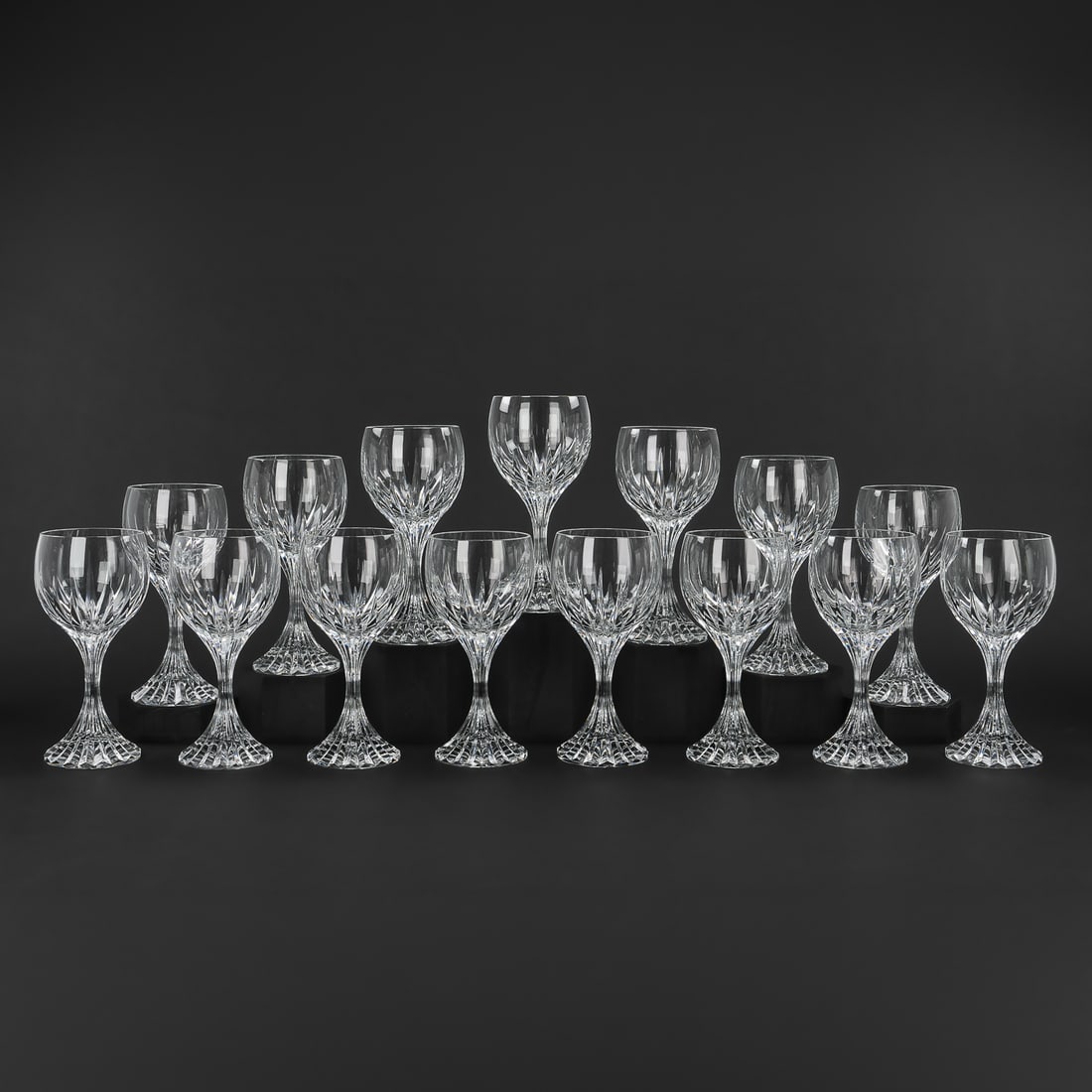 15 Baccarat Massena Wine Goblets: Set of 15 Baccarat "Massena" pattern signed French crystal red wine or water goblets with solid ridged bases, overall excellent condition. 7"