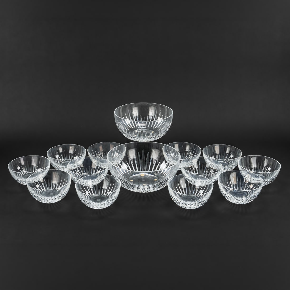 14 Baccarat Massena Serving and Berry Bowls: Set of 12 Baccarat "Massena" pattern signed French crystal berry or finger bowls, accompanied by two matching serving bowls, overall excellent condition. 4.5"-8" dia.