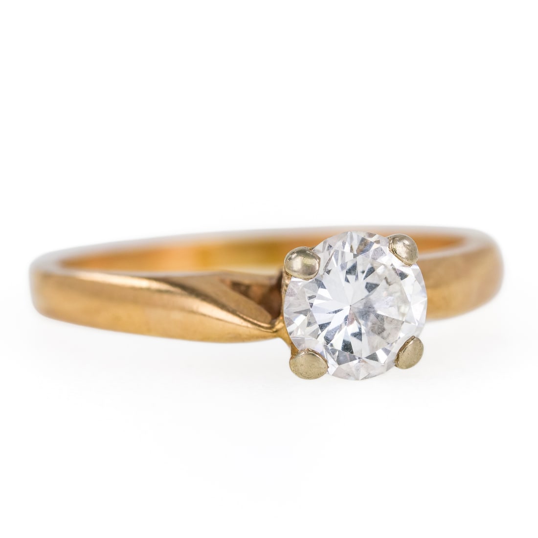 1 Carat Diamond Solitaire Ring: Approx. 1 CT modern round cut diamond ring set in 14k yellow gold. 4 prong setting. VS2, G-H. 6.3 mm x 4 mm Ring size 7.5.
