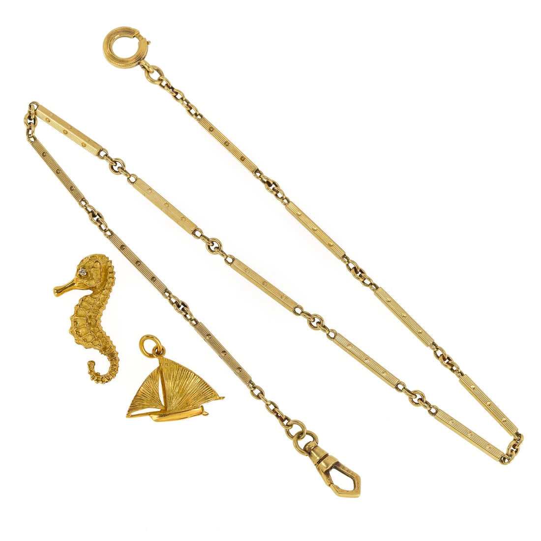 14k Watch Chain & 2 Charms: 14k yellow gold watch chain, 14" long. With two 14k yellow gold charms, a sailboat and seahorse. 17.18 grams.