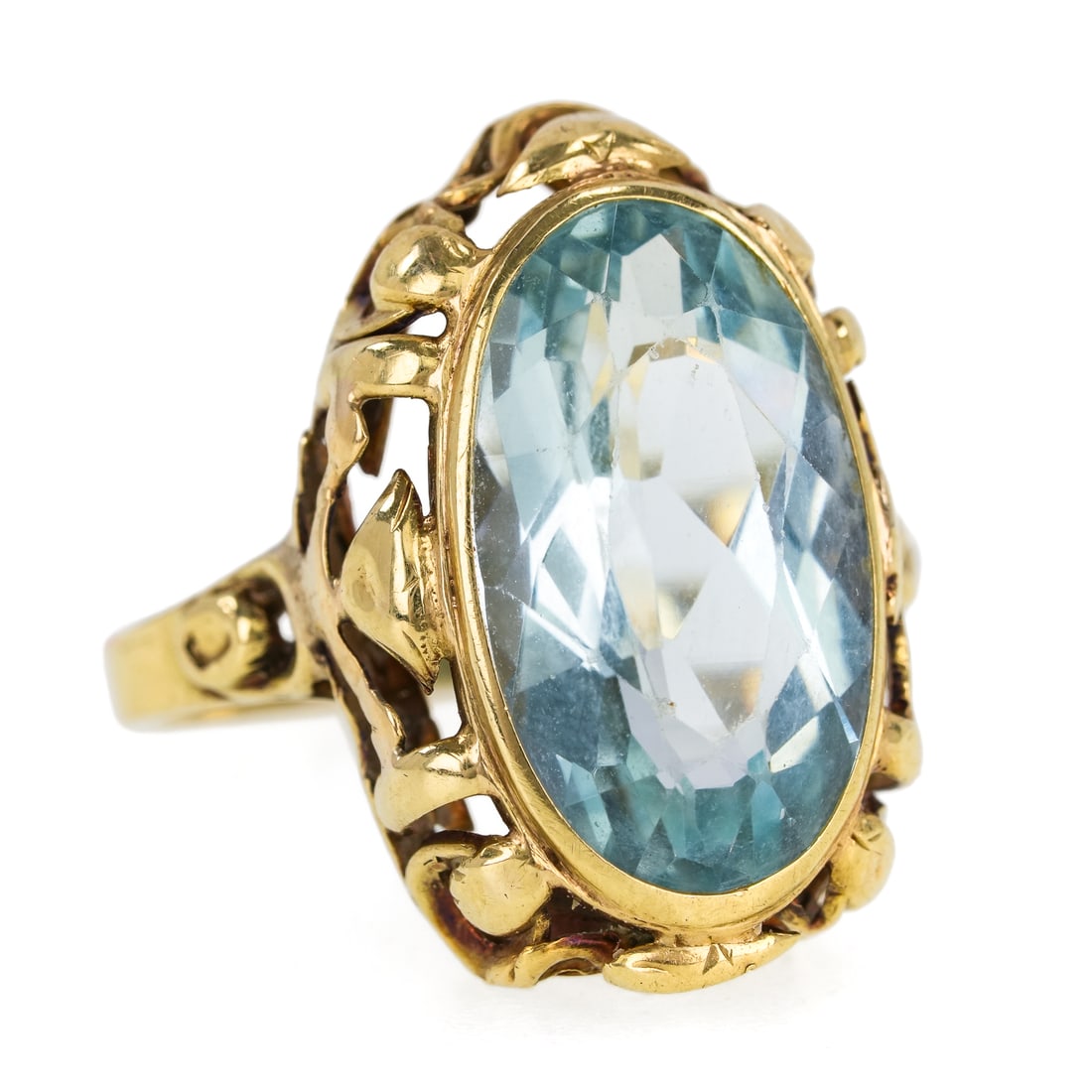 Victorian 4.5 Carat Aquamarine Ring: Ornate 14k yellow gold Victorian ring with center bezel set oval cut 4.5 carat aquamarine 16 mm x 10 mm x 6mm. Ring size 7. 4.2 grams t.w.