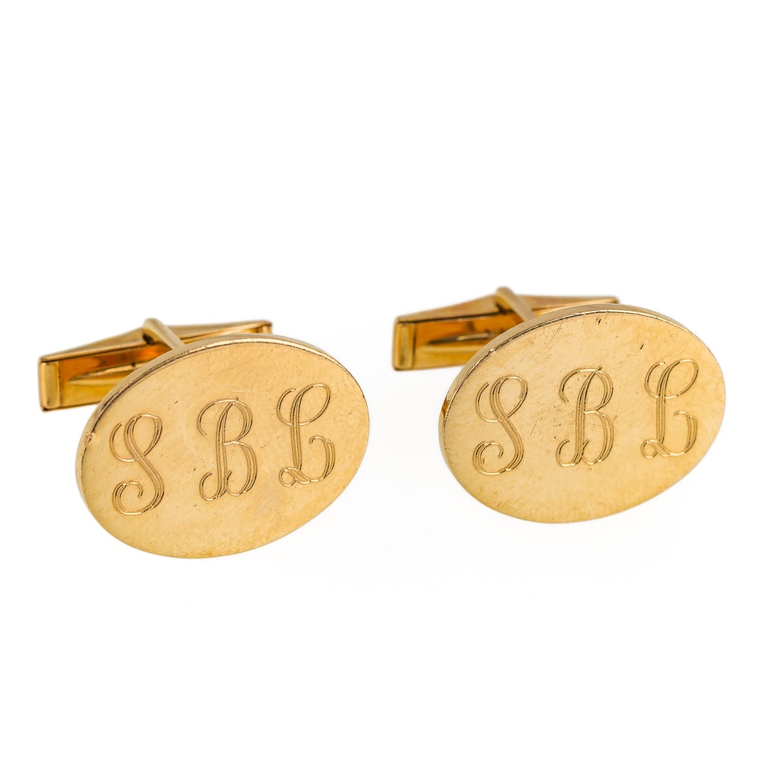 Pair of 14k Cufflinks: pair of 14k yellow gold cufflinks. Oval, 21 mm x 16 mm, monogrammed S B L. 11.67 grams.