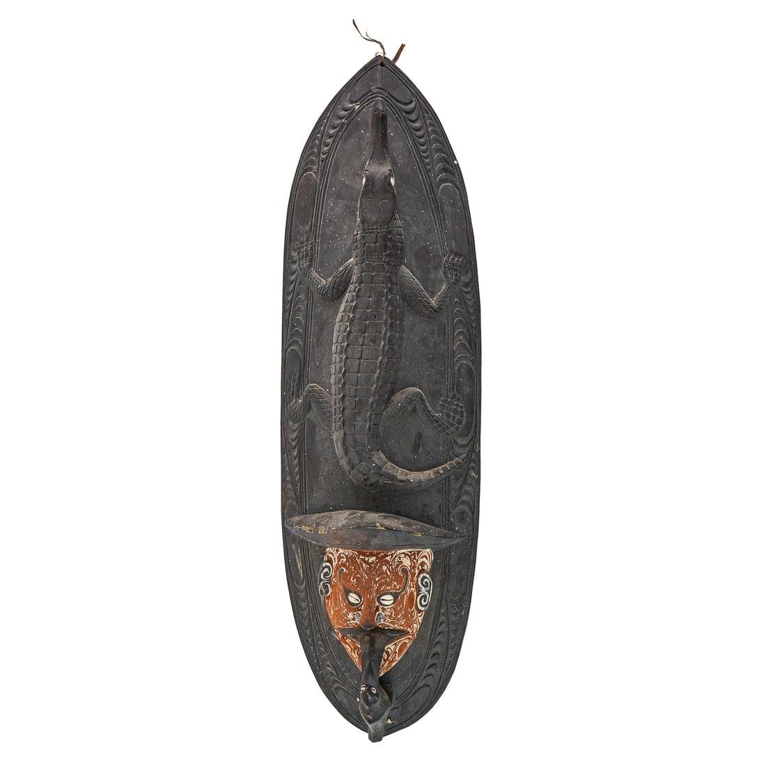 Papua New Guinea Carved Wooden Shield: Karawari River, East Sepik Province carved wooden shield, purchased in 1989 in a small village in the area of Karawari Lodge, ht 33"