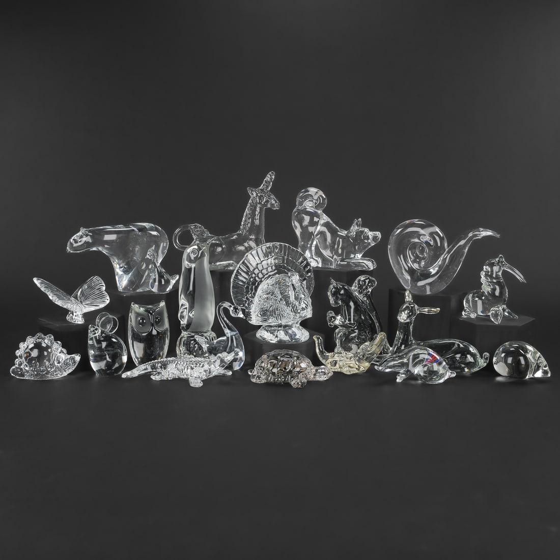 20 Art Glass Animal Figures incl. Waterford: Collection of 20 crystal art glass animal figurines including Waterford turkey and butterfly, and a variety of other signed figures, snail, walrus, owl, bear, penguin, mouse, alligator, turtle, etc.