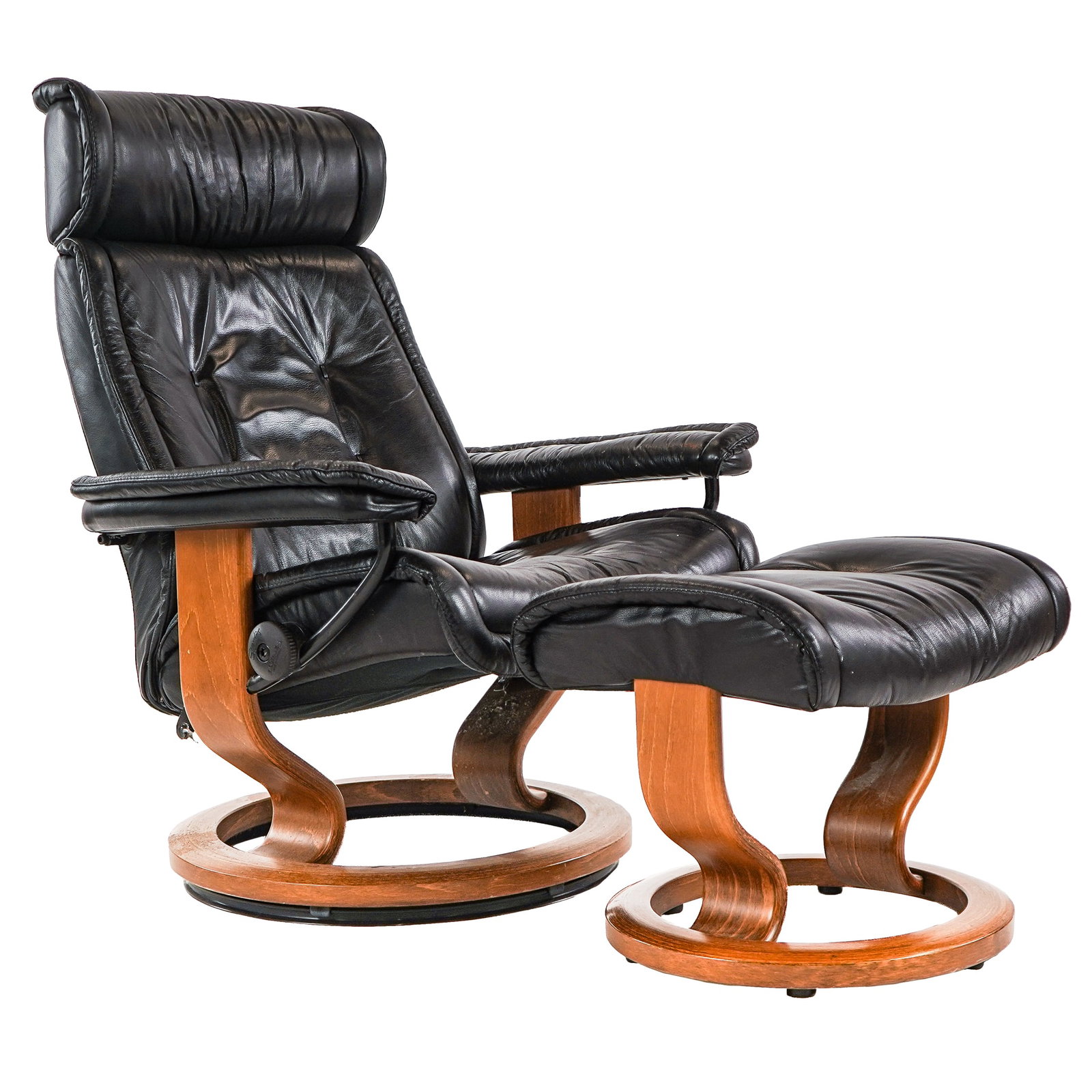 Ekornes Stressless lounge chair: Ekornes Stressless lounge chair with footstool in patinated black leather- 37 x 30 x 34" 15" to seat ottoman- 16 x 21 x 15"