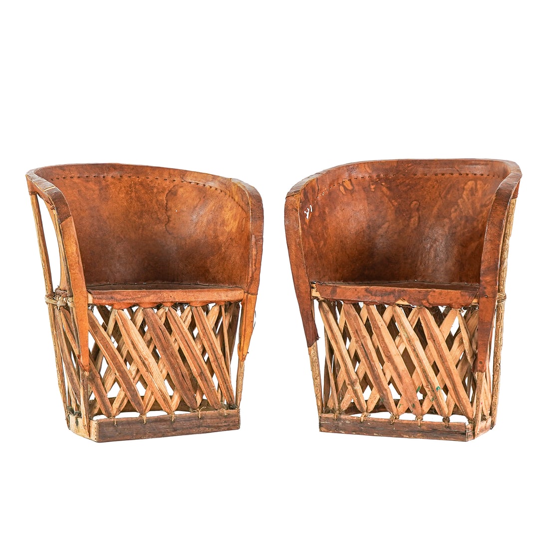 Pair of Mexican Equipale leather chairs: Pair of Mexican Equipale leather chairs
