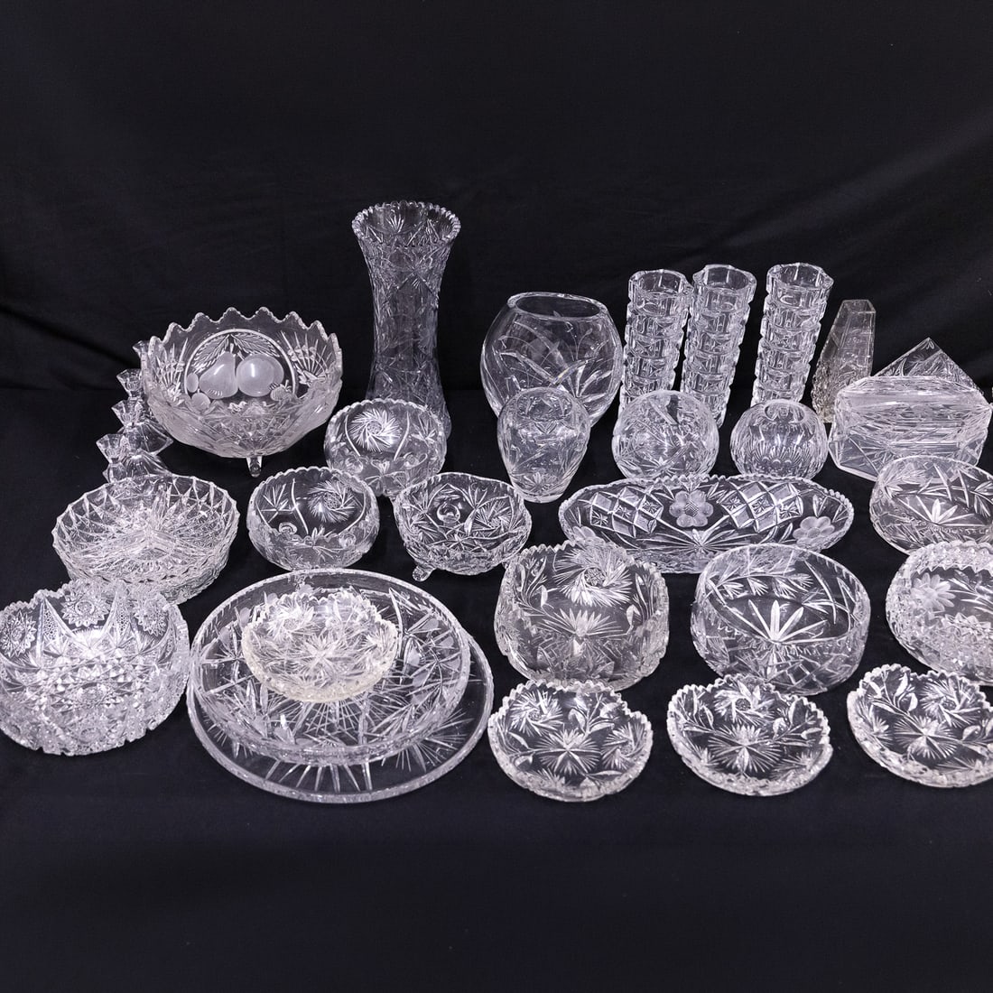 Large Lot of Lead Crystal Tableware: Large lot of approximately 54 pcs. of lead crystal tableware including many cut glass items, some American Brilliant period, some pressed glass items. Vases, bowls, dishes, candlesticks, etc.