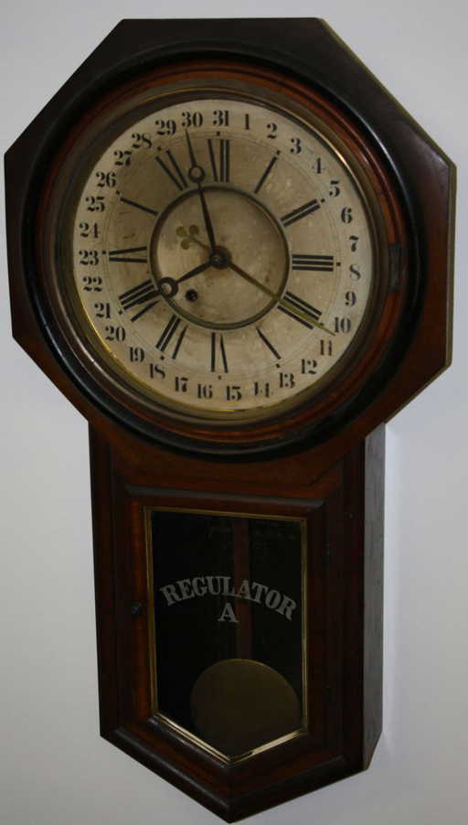 Ansonia “Regulator A” calendar dial wall clock in