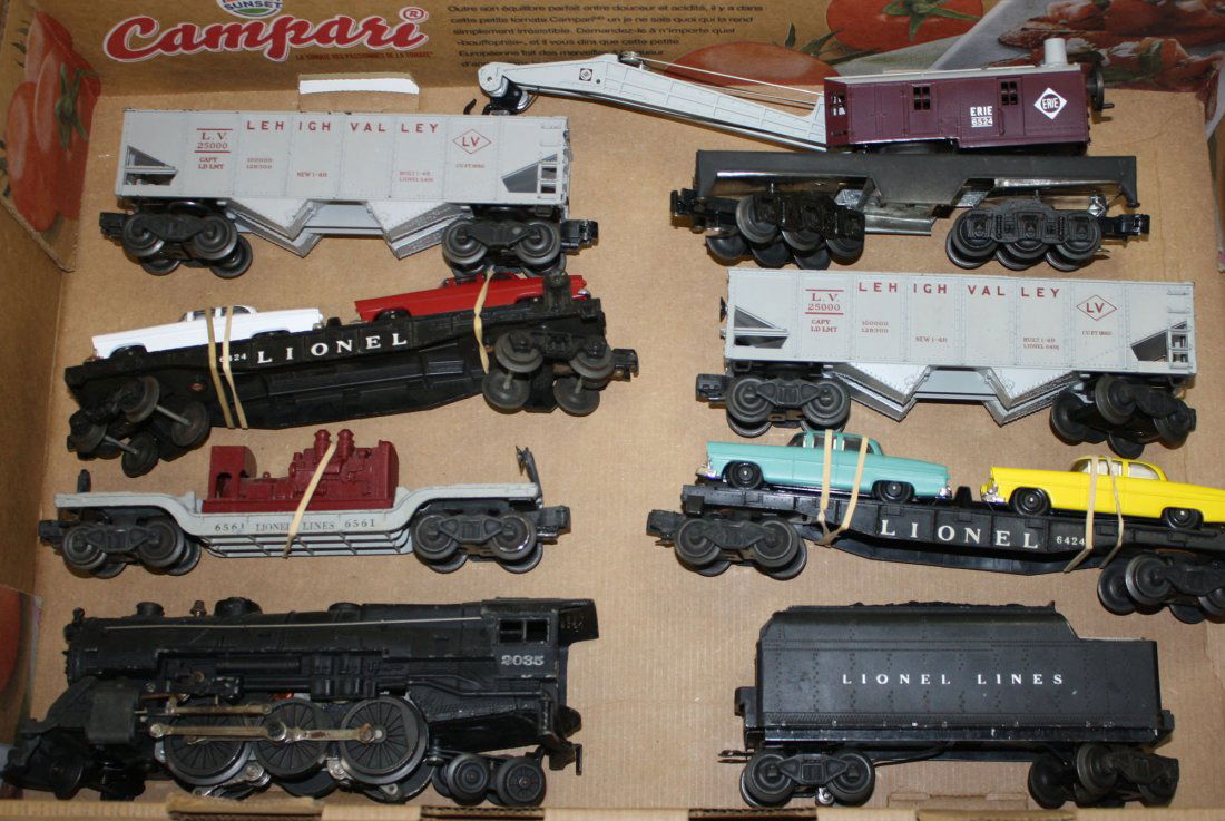 Lionel O Gauge No. 2035 2-6-4 engine w/ tender, 2-: Lionel O Gauge No. 2035 2-6-4 engine w/ tender, 2- 6424 car carriers, 2-6456 coal cars, 6524 crane car, 6561 lowrider- 8 pcs