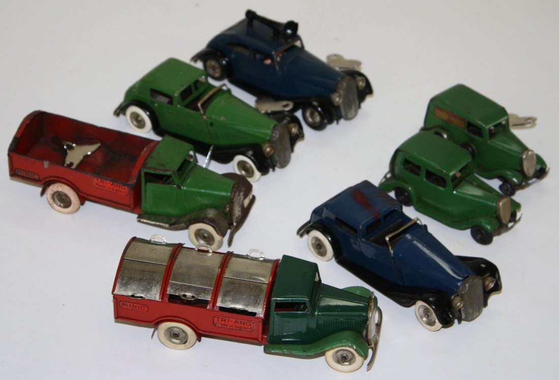 7 Tri- Ang Minic key-wind cars & trucks-2 with: 7 Tri- Ang Minic key-wind cars & trucks-2 with alterations or losses, various condition, lengths 3”- 5.5”