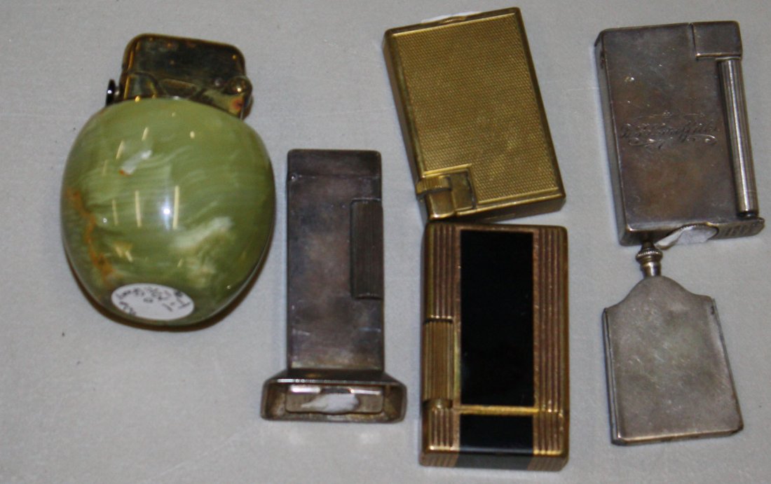 Six Dunhill Swiss cigarette lighters incl. Sterling: Six Dunhill Swiss cigarette lighters incl. Sterling case, Tiffany & Co. onyx lighter, and continental silver lighter 6 pcs.