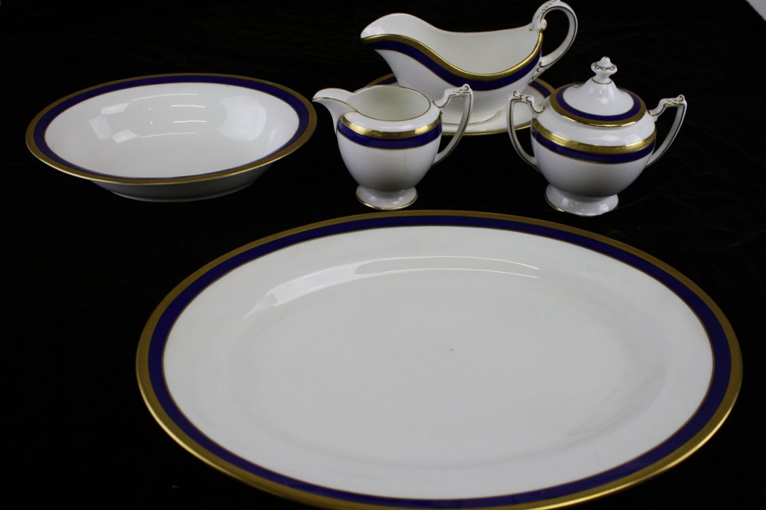 Coalport "Elite Royale" 126 pc dinner service: Coalport cobalt and gold banded "Elite Royale" 126 pc dinner service w/ demitasse and bouillon soups12 demitasse saucers, 12 fruit nappies, 4 bread and butter plates, 12 saucers, 12 boullion saucers, 