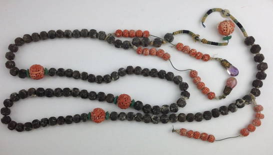 Chinese ca. 1900 necklace with carved nut beads, coral: Chinese ca. 1900 necklace with carved nut beads, coral carved beads, and jade flowers. 56" long.