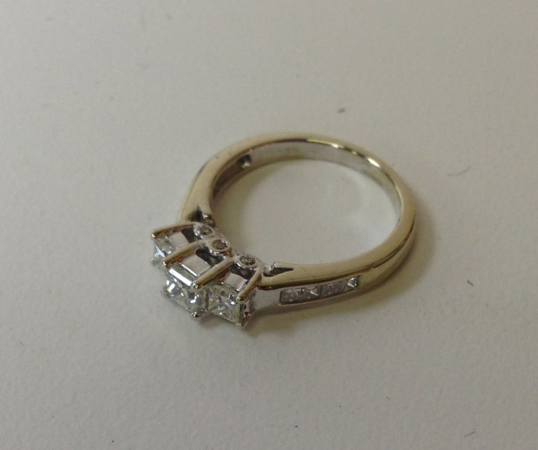 14k w.g 3 stone princess diamond ring with 1 ct. t.w.: 14k w.g 3 stone princess diamond ring with 1 ct. t.w. 3.69 grms.