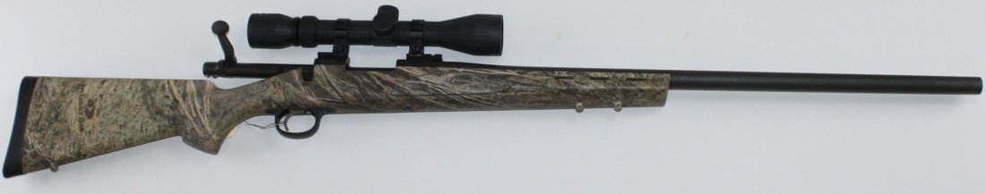 Remington Model 700 ADL Varmint in .308 Winchester with: Remington Model 700 ADL Varmint in .308 Winchester with composite mossy oak stock, and heavy contour barrel, like new with FM 3x9 power scope FFL# 1712
