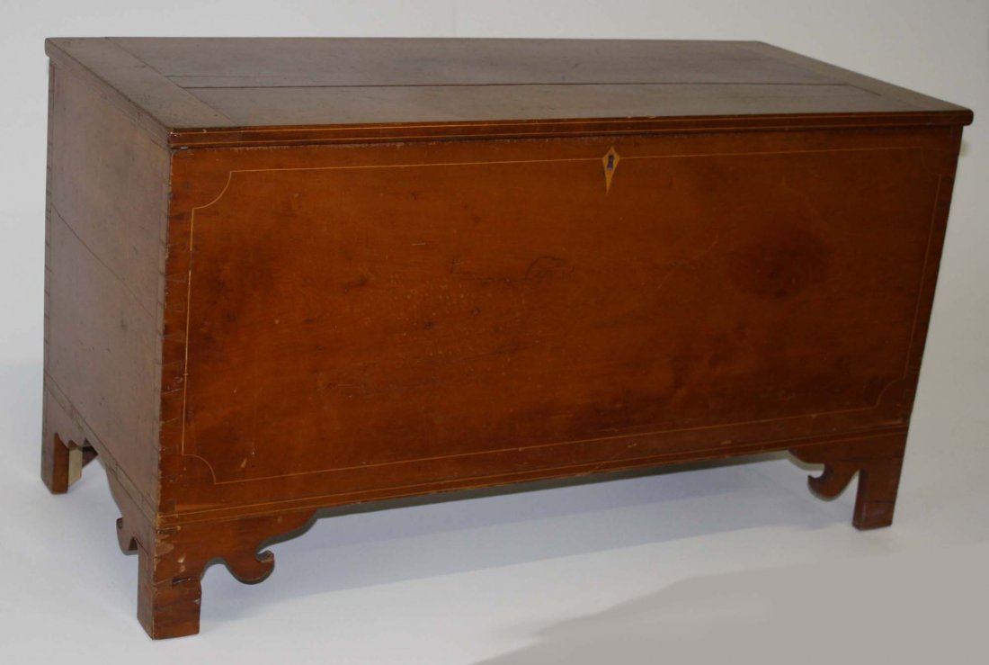 KY Chippendale cherry string inlaid blanket chest on: KY Chippendale cherry string inlaid blanket chest on bracket base. 39"w x 21½"h.