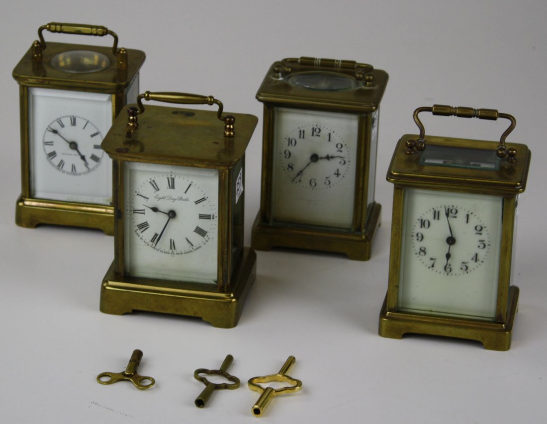 4 small brass carraige clocks- 2 unmarked w/ open (1 of 1)