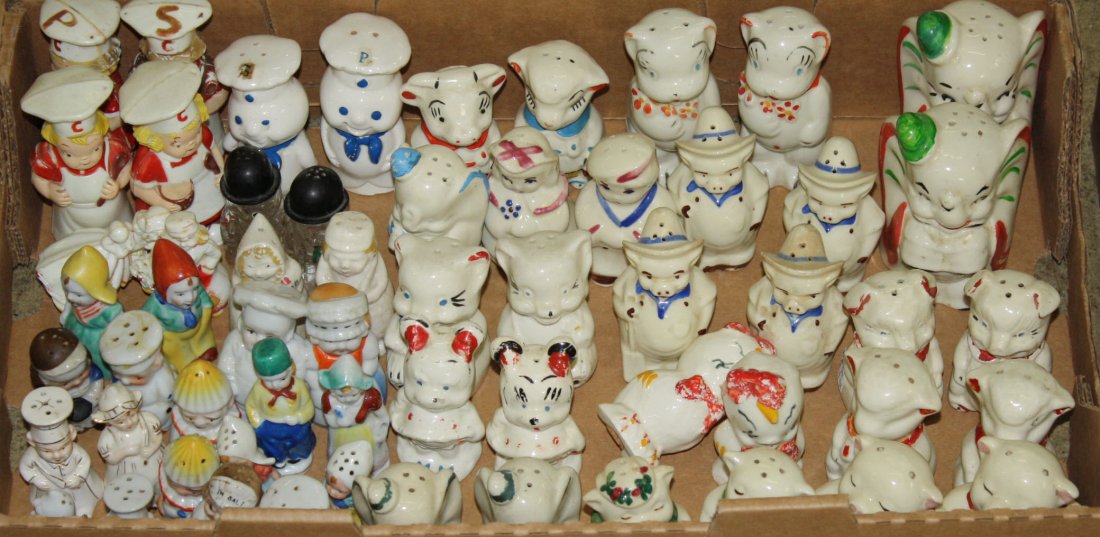 Group of 20+ pair of Shawnee and USA pottery salt and: Group of 20+ pair of Shawnee and USA pottery salt and pepper shakers, matching pitcher