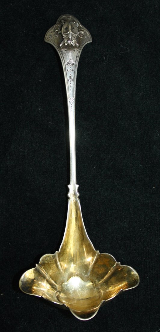 Sterling ladle with fluted gold wash bowl and ornate: Sterling ladle with fluted gold wash bowl and ornate handle with three-dimensional beetle. Marked both J.E. Caldwell and Ball Black & Co on the handle. 7¼"l. 1.6 troy oz.