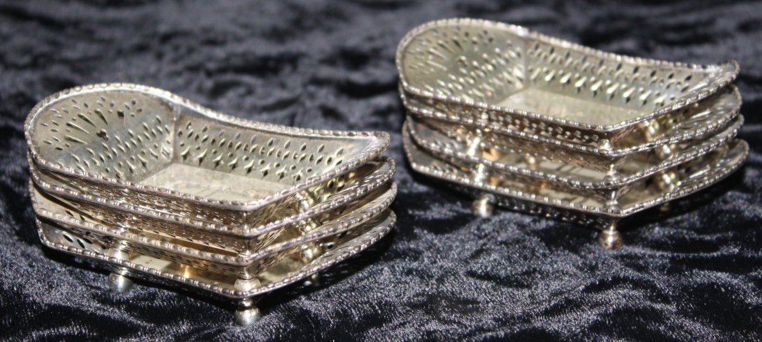 Small sterling pierced footed bowls with C monogram.: Small sterling pierced footed bowls with C monogram. Marked A. Stowell & Co and RW for Roger Williams. 9.01 troy oz. 8 pcs.