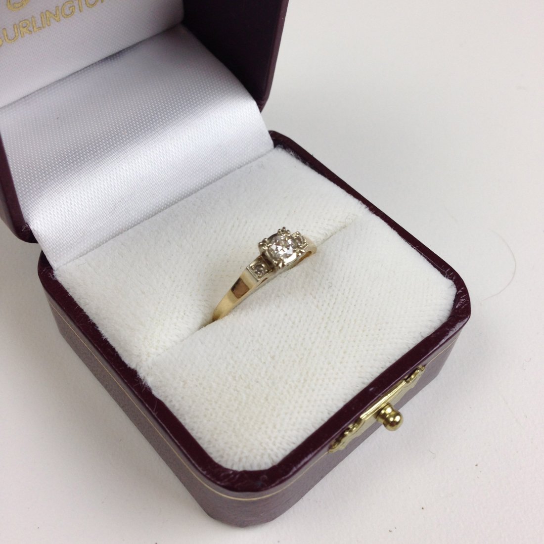 Ca 1930s 14k y.g. engagement ring with .15ct diamond: Ca 1930s 14k y.g. engagement ring with .15ct diamond with 2 .04ct rd cut diamonds.