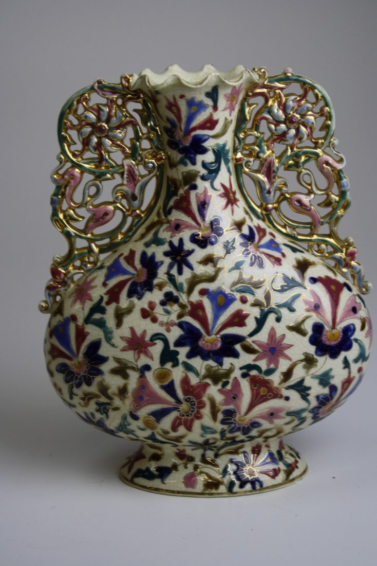 Ornate Zsolnay type gilt and polychrome double handle: Ornate Zsolnay type gilt and polychrome double handle vase 11" x 9"-repair on base