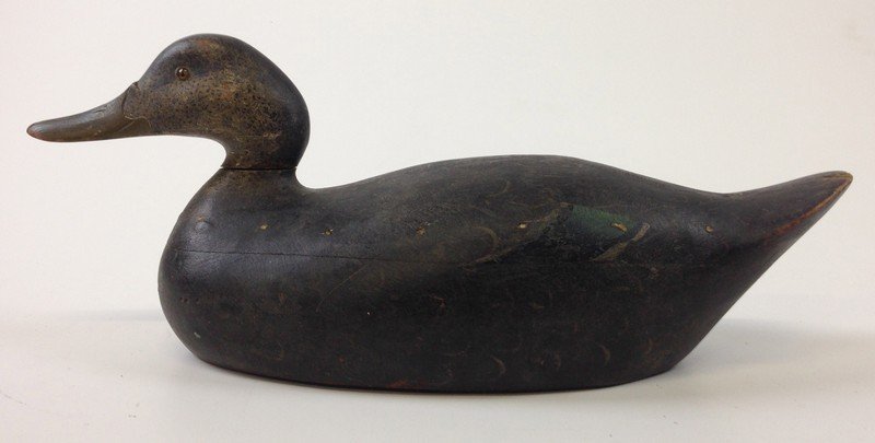 Premier grade Mason black duck decoy in original paint.: Premier grade Mason black duck in original paint. Chip to tail. Light wear.