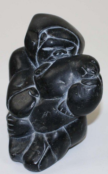 Inuit/ Canadian Eskimo soapstone carving of hunter &: Inuit/ Canadian Eskimo soapstone carving of hunter & seal w/ original Canadian Govt sticker on base- ht 6.5”