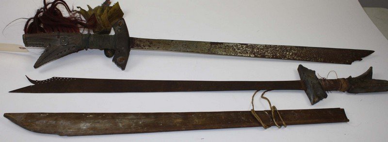 19th c Indonesian Islands/ Borneo kampilon sword: 19th c Indonesian Islands/ Borneo kampilon sword w/ brass & copper inlay- probably Dayak Mandau- length 39.5”, blade length 29”, sold with another closely related sword- Moro peoples Northern Born