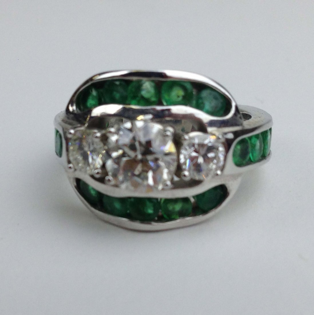 Ladies diamond , emerald and platinum ring having (1 of 2)