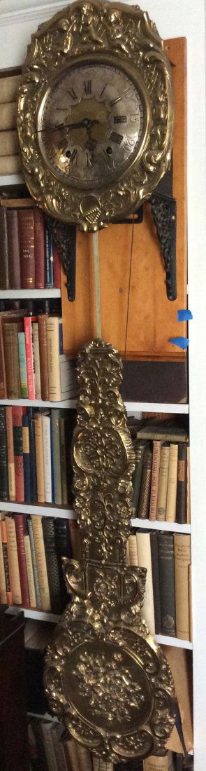 Morbier clock, fancy embossed brass dial surround of (1 of 2)