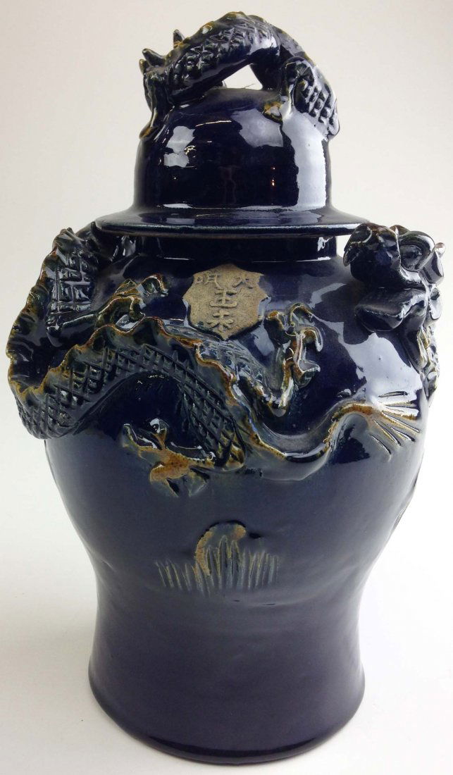Chinese Shiwan stoneware dragon covered jar with deep (1 of 3)