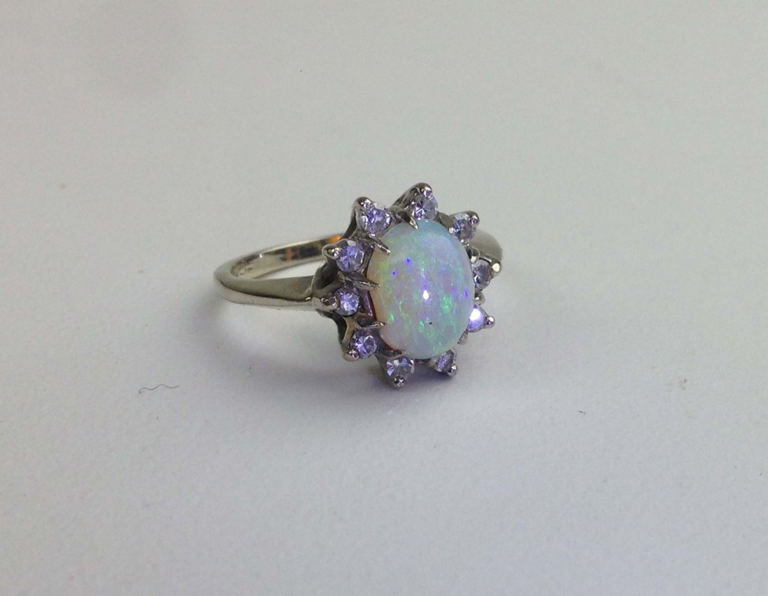 14k w.g. ring with oval opal center surrounded by 10 (1 of 1)
