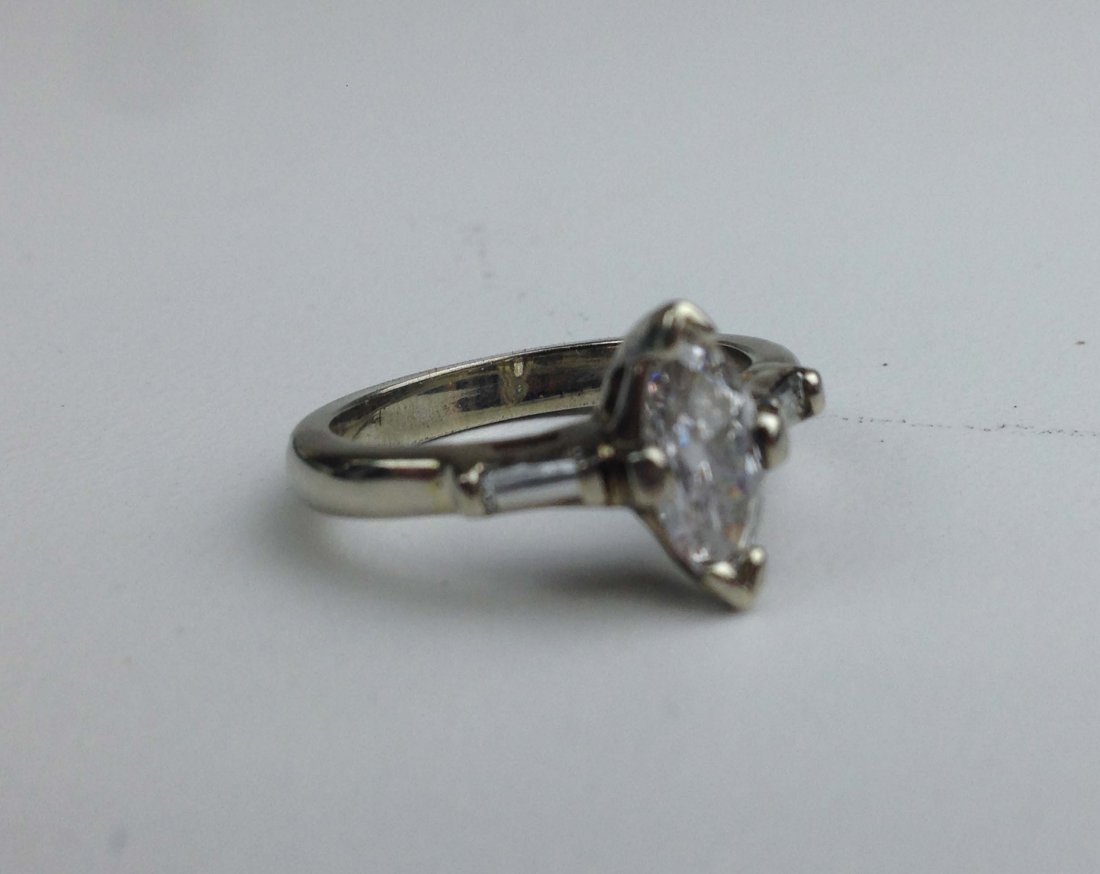Unmarked w.g. ring having marquis cut diamond est 1 ct (1 of 1)