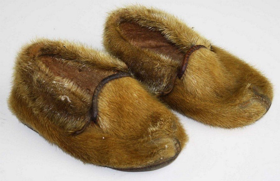 Pair seal skin and leather eskimo child's moccasins.: Pair seal skin and leather eskimo child's moccasins. 6"l.