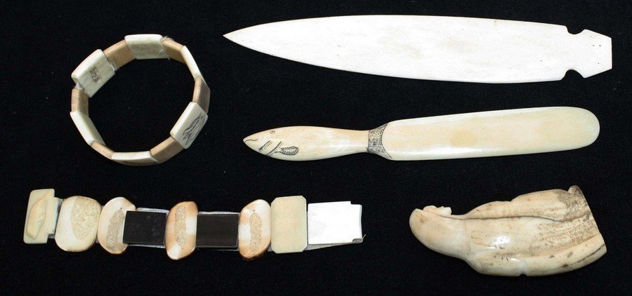 5 Inuit bone & walrus tusk carved pieces including: 5 Inuit bone & walrus tusk carved pieces including bracelets, figure, letter opener, spreader, length 3”- 7”