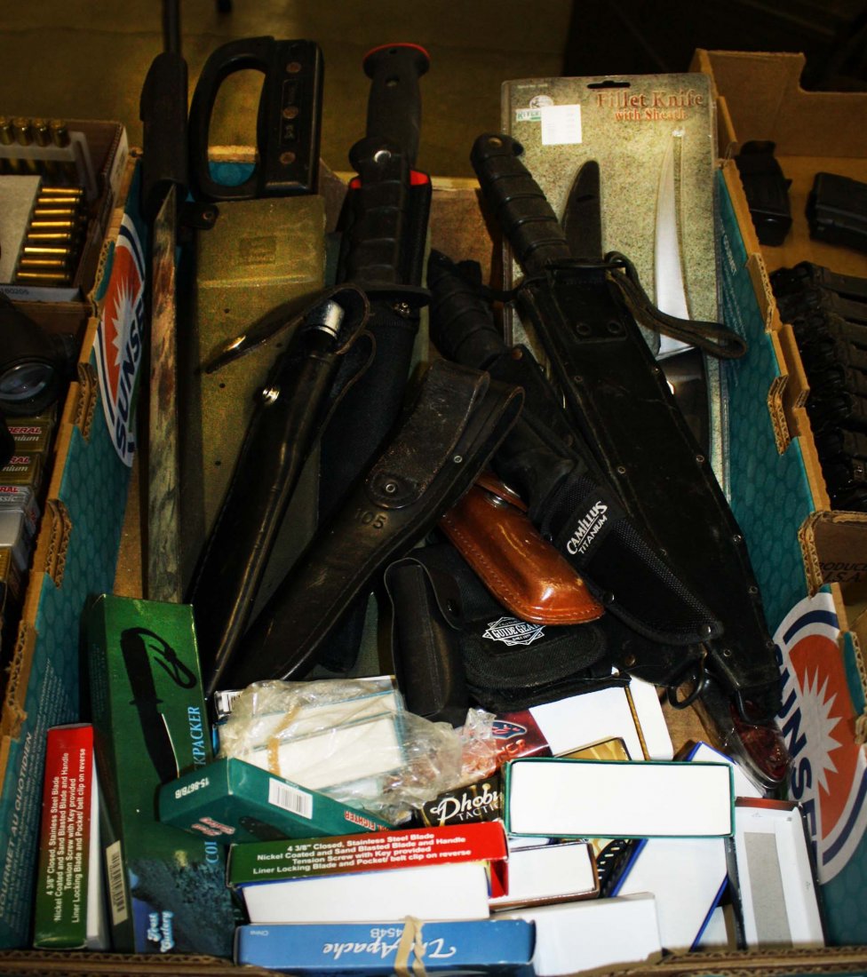 Large lot of approx 50 knives and machetes including: Large lot of approx 50 knives and machetes including Ontario, Buck, Camillus Titanium, Sharp etc