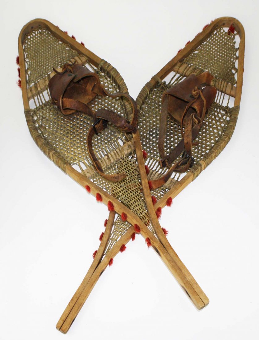 late 19 th c pr of snowshoes w/ red tufts of wool to: late 19 th c pr of snowshoes w/ red tufts of wool to simulate moose hair, probably Canada or Vermont, length 37â€