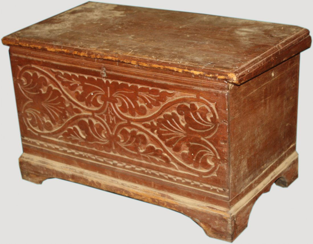 17th-18th c American carved oak and pine red painted: 17th-18th c American carved oak and pine red painted bible box, initials TRM in front. Base restored.