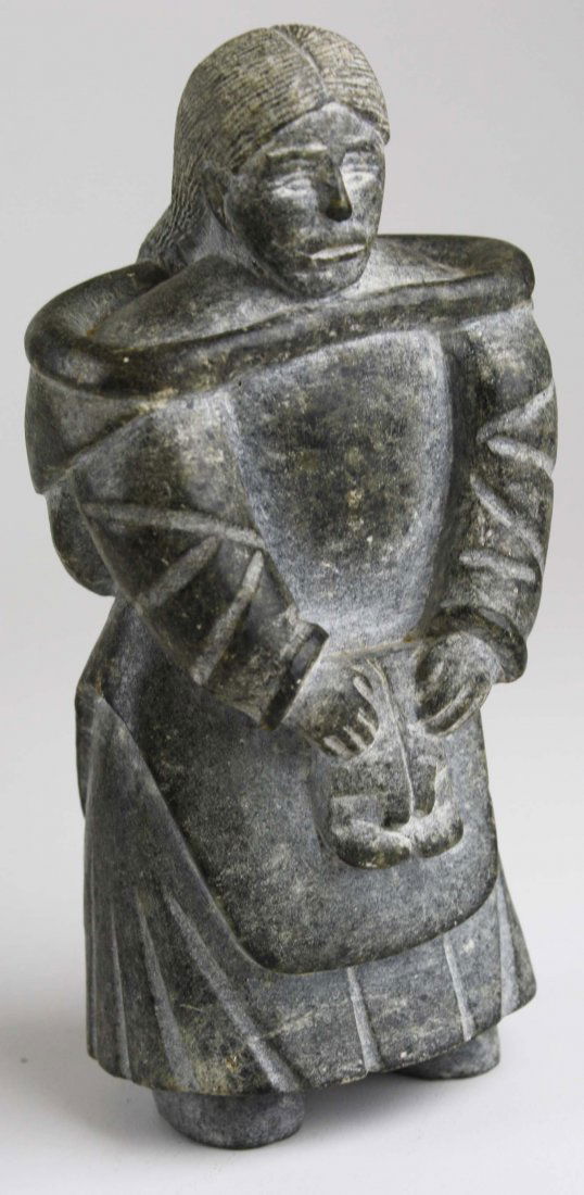 Inuit soapstone carving of a woman with mittens, signed (1 of 4)