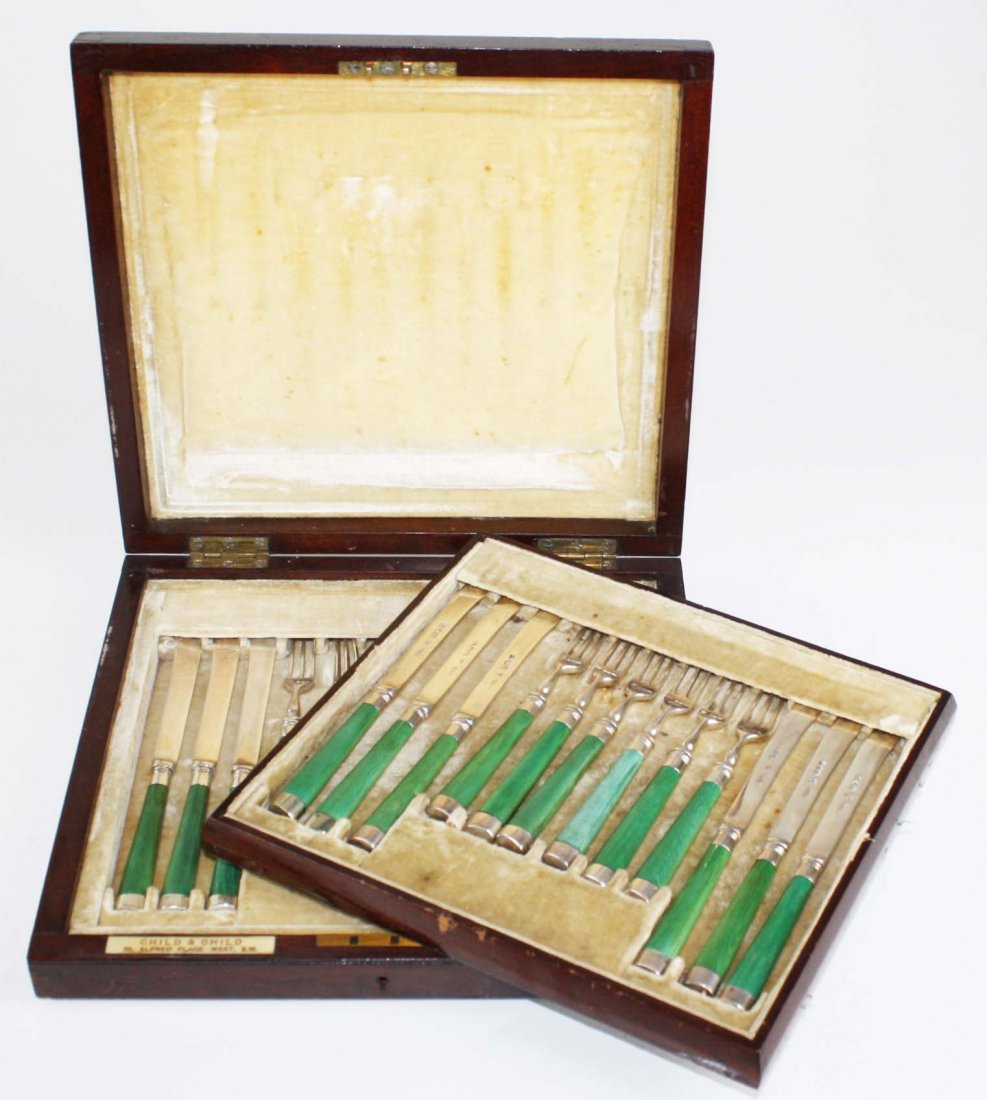 small cased presentation flatware set descending in the (1 of 4)