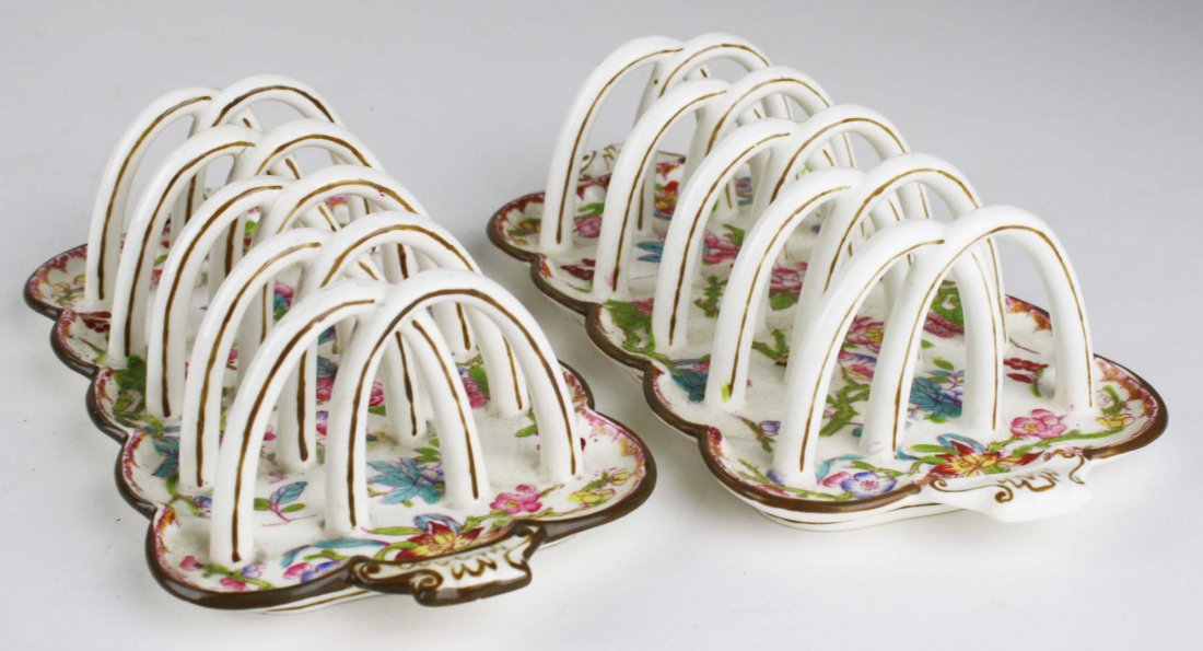 pr of Minton toast racks, one with hairline crack,: pr of Minton toast racks, one with hairline crack, length 8.5”