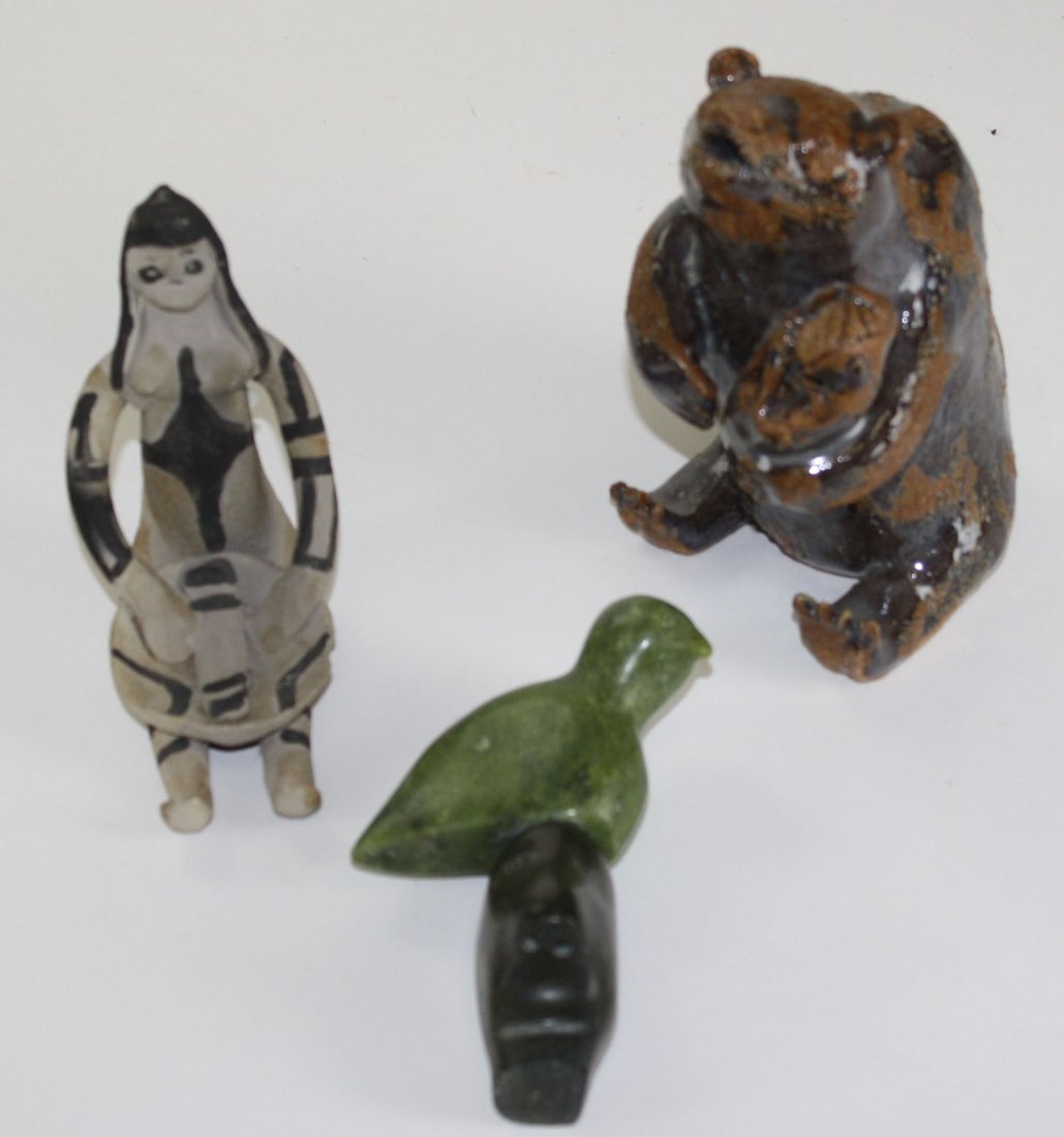 Inuit soapstone effigy of shaman w/ puffin (ht 6”),: Inuit soapstone effigy of shaman w/ puffin (ht 6”), Cochiti pottery effigy figure of a woman (ht 6”), & a contemporary pottery figure of a bear & baby signed MM on base (ht 7.5”)
