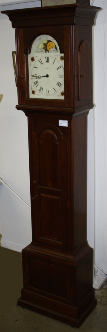 Grandfather clock, Howard Miller cherry case, moon: Grandfather clock, Howard Miller cherry case, moon phase brass works, early style. 82½"h.