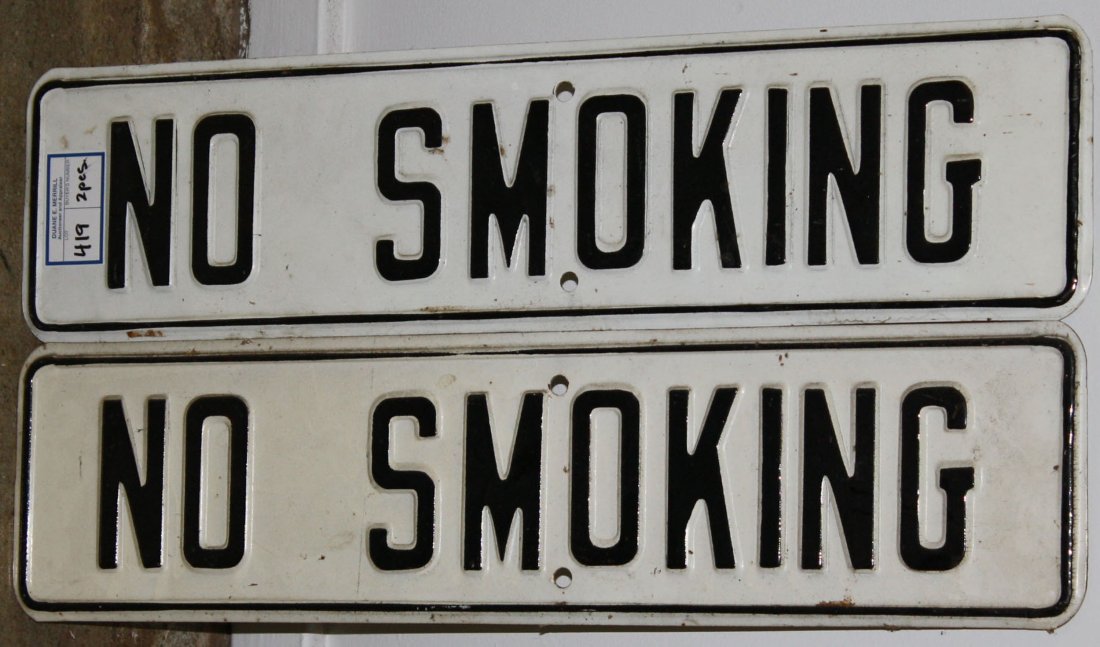 Two embossed steel plate black and white mid-20th c. No: Two embossed steel plate black and white mid-20th c. No Smoking signs 24" x 6"