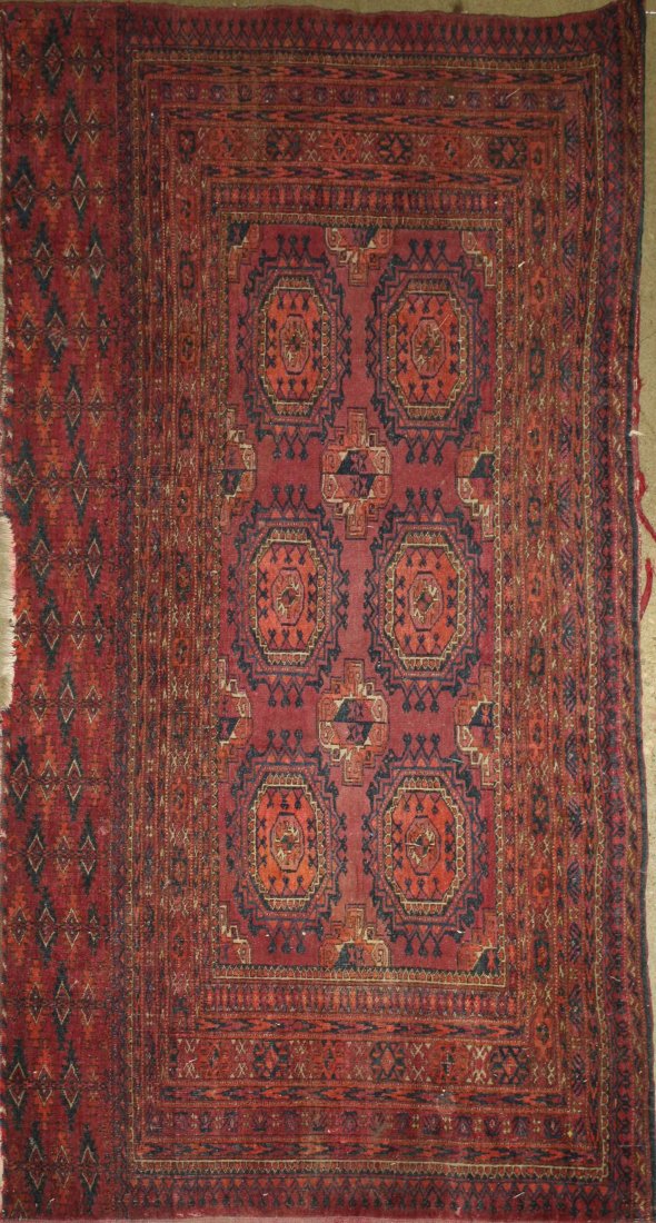 early 20th c Tekke Salor bag face with two rows of: early 20th c Tekke Salor bag face with two rows of three guls, encorporates two Sariq guls at center, unusual long form, area of loss, 2' 5” x 5' 1”