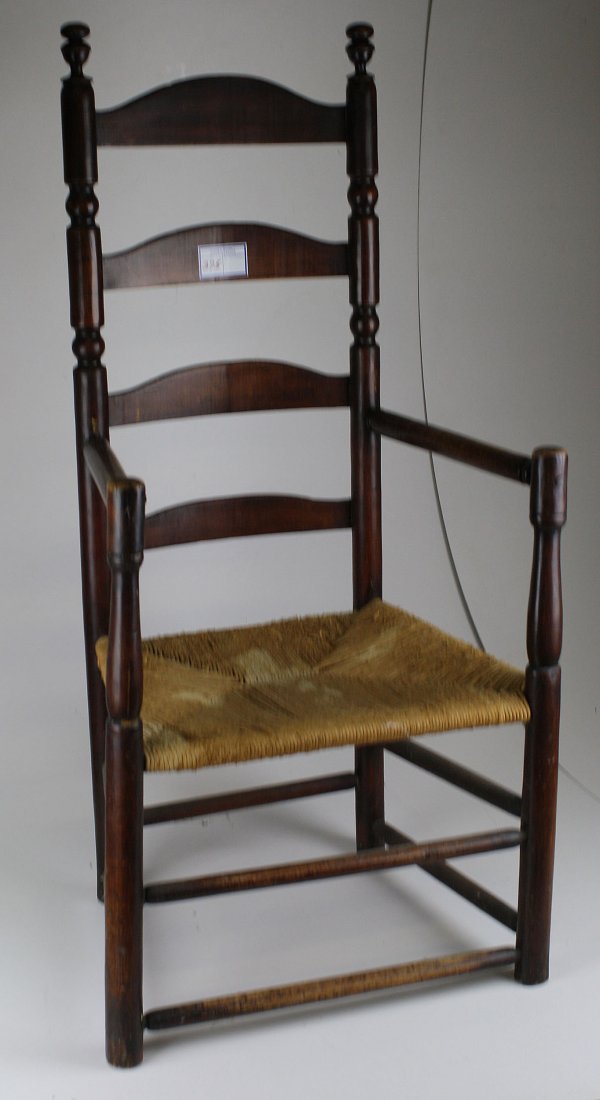 Early New England maple turned ladder-back arm chair.: Early New England maple turned ladder-back arm chair. Appears original.