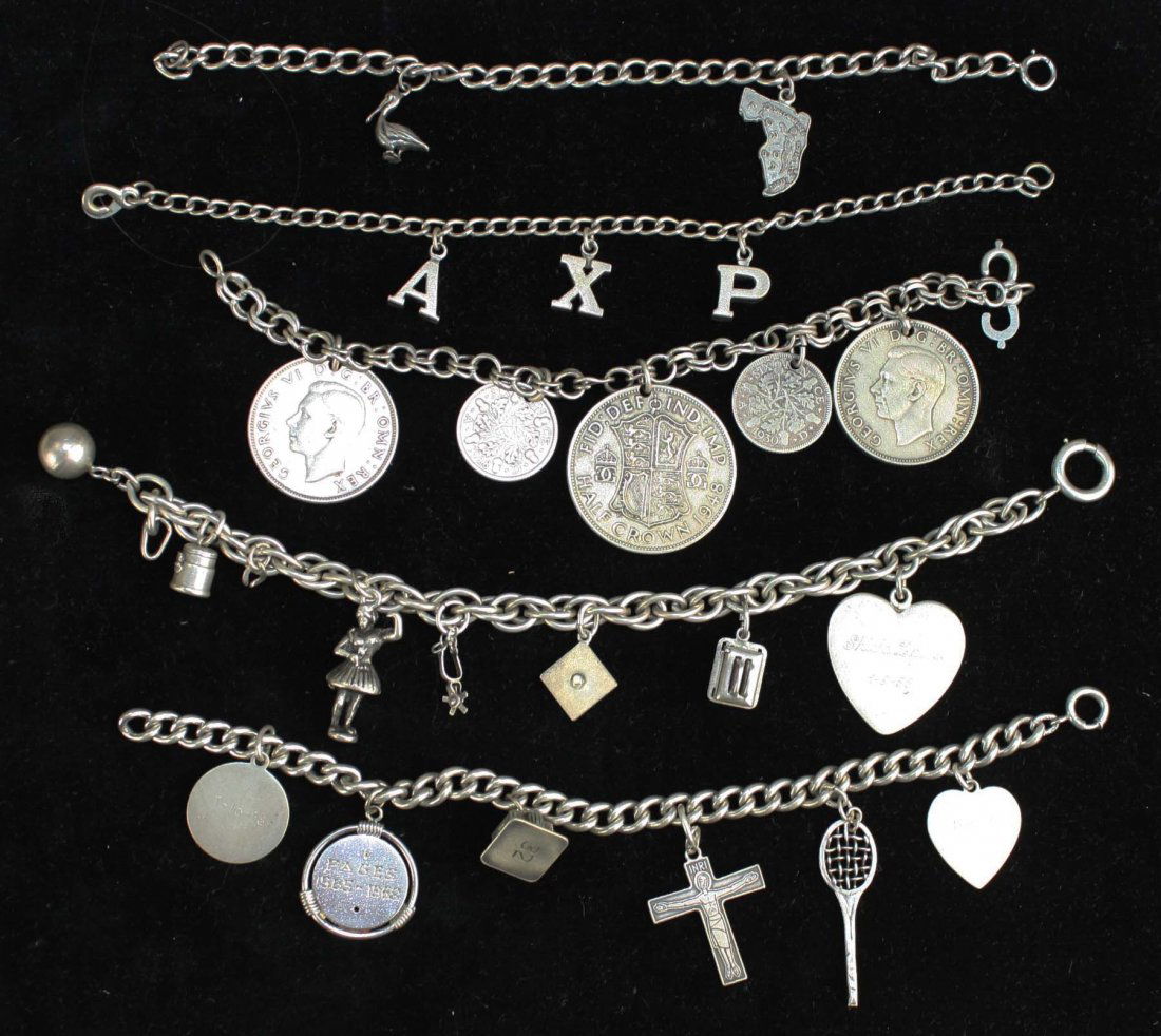 group of 5 1950's silver charm bracelets , with various (1 of 6)